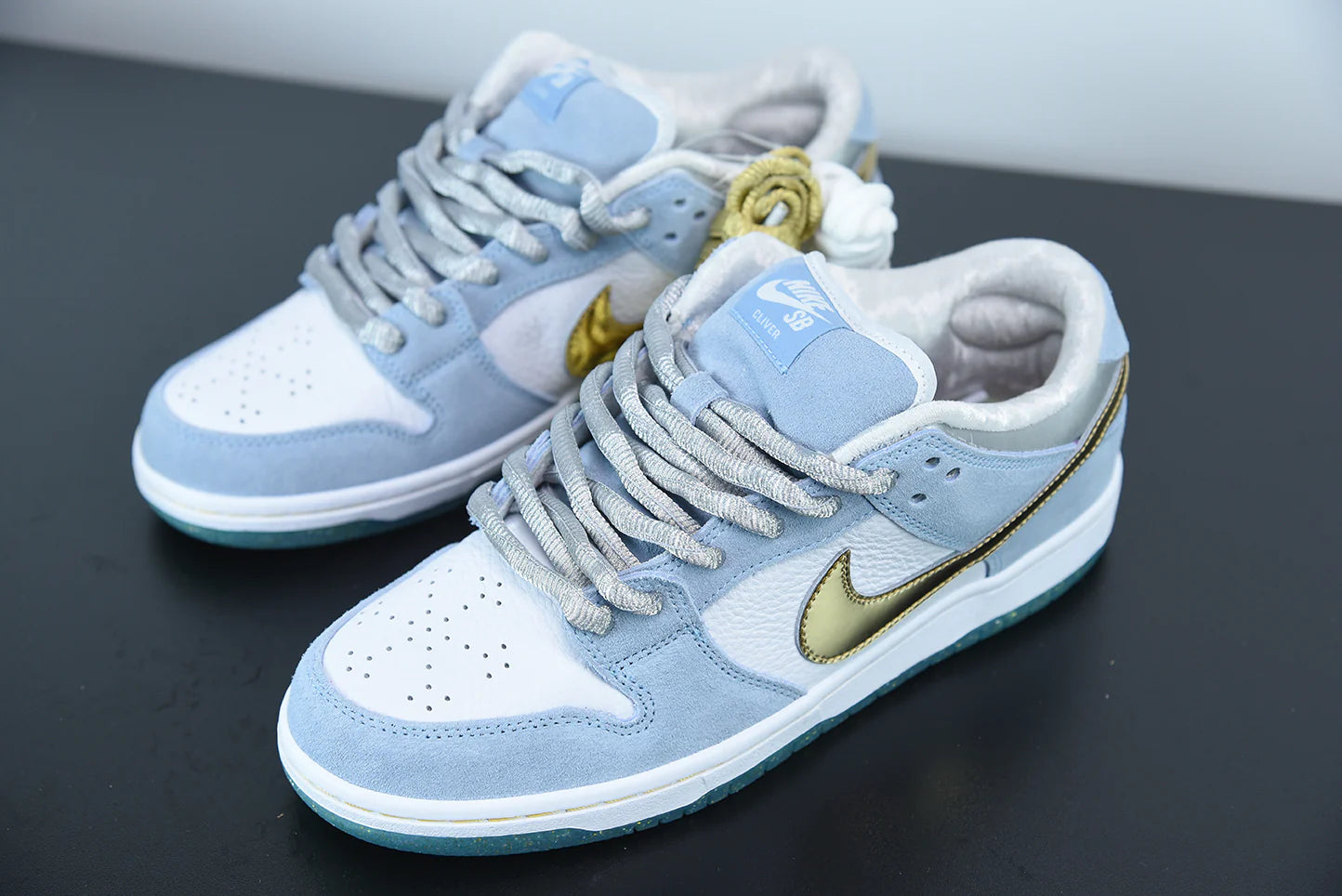 Nike x Sean Cliver SB Dunk Low “Holiday Special”