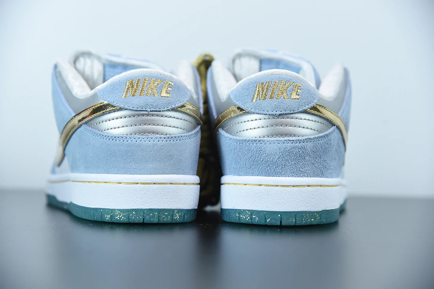 Nike x Sean Cliver SB Dunk Low “Holiday Special”