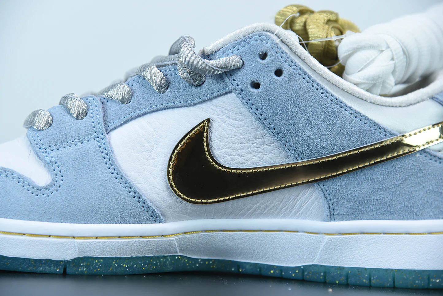 Nike x Sean Cliver SB Dunk Low “Holiday Special”