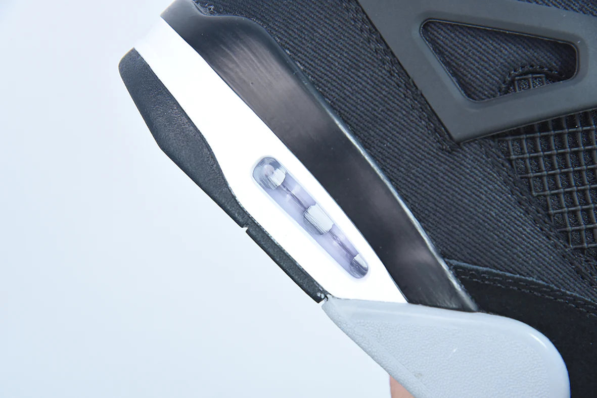 Air Jordan 4 Retro “Black Canvas”