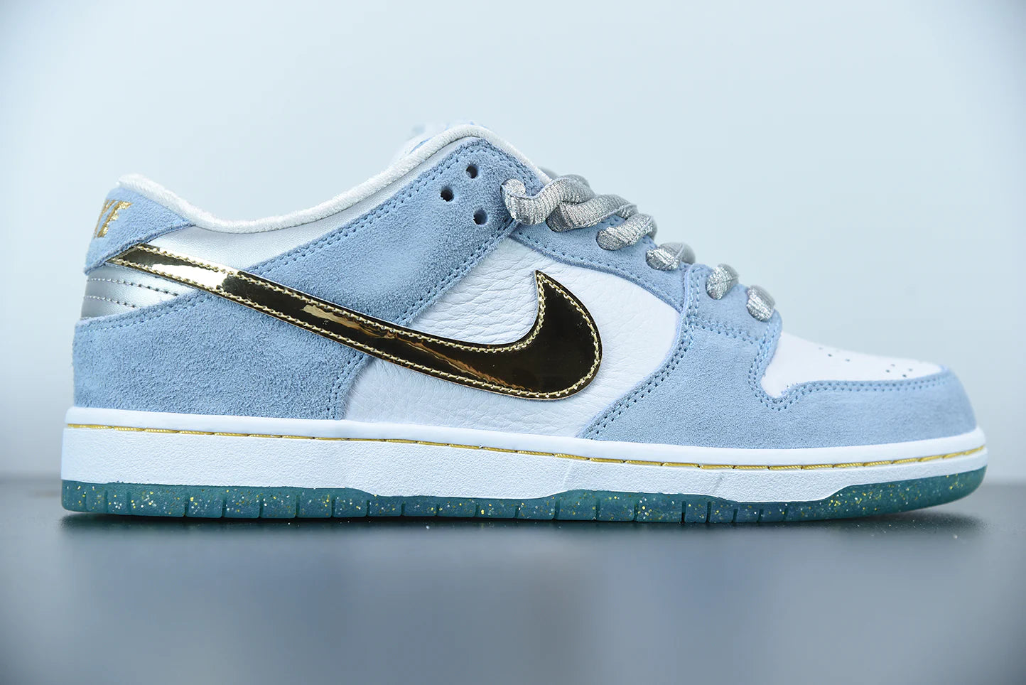 Nike x Sean Cliver SB Dunk Low “Holiday Special”