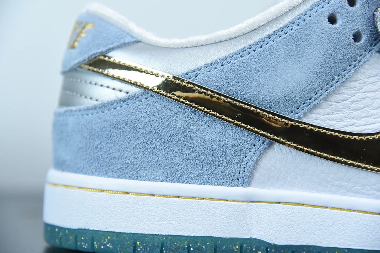 Nike x Sean Cliver SB Dunk Low “Holiday Special”