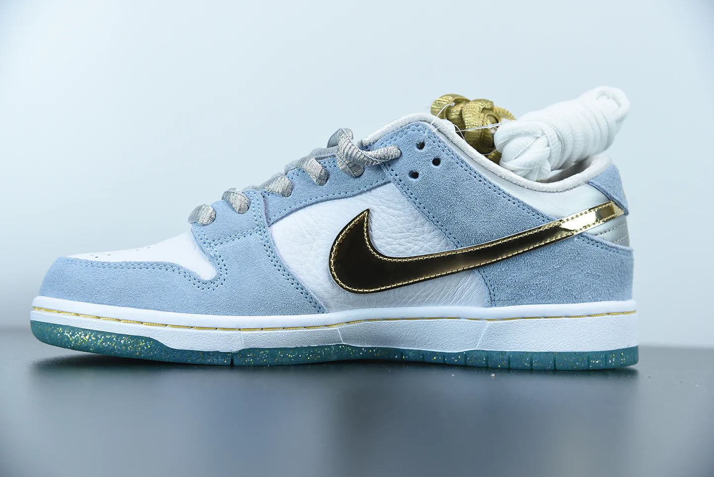 Nike x Sean Cliver SB Dunk Low “Holiday Special”